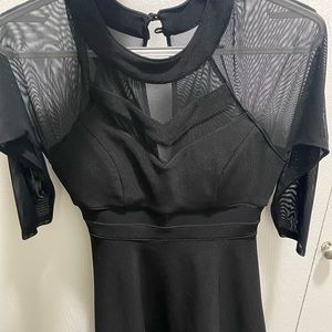 Never worn black long sleeved dress.looking for size 4-6